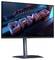 Ein schlanker Gaming-Monitor zeigt ein farbenfrohes Bild mit dem Wort "GAMING" in fetten, beleuchteten Buchstaben und futuristischen Designelementen.