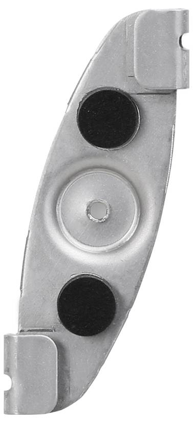 Ein metallisches ovales Objekt mit zentraler kreisförmiger Vertiefung und zwei schwarzen kreisförmigen Polstern an einer Seite, möglicherweise eine Schutzhalterung oder Befestigung.