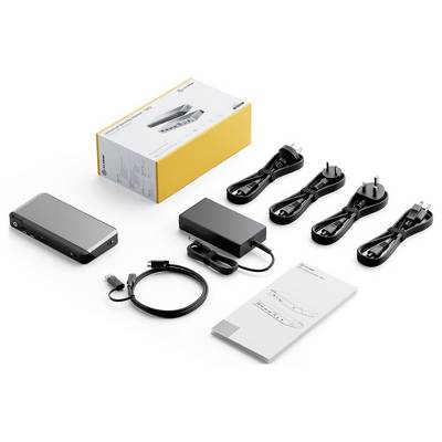 Ein Dockingstation-Paket enthält das Gerät, ein Netzteil, mehrere Steckertypen, ein USB-Kabel und eine Bedienungsanleitung, verpackt in einer Markenschachtel.