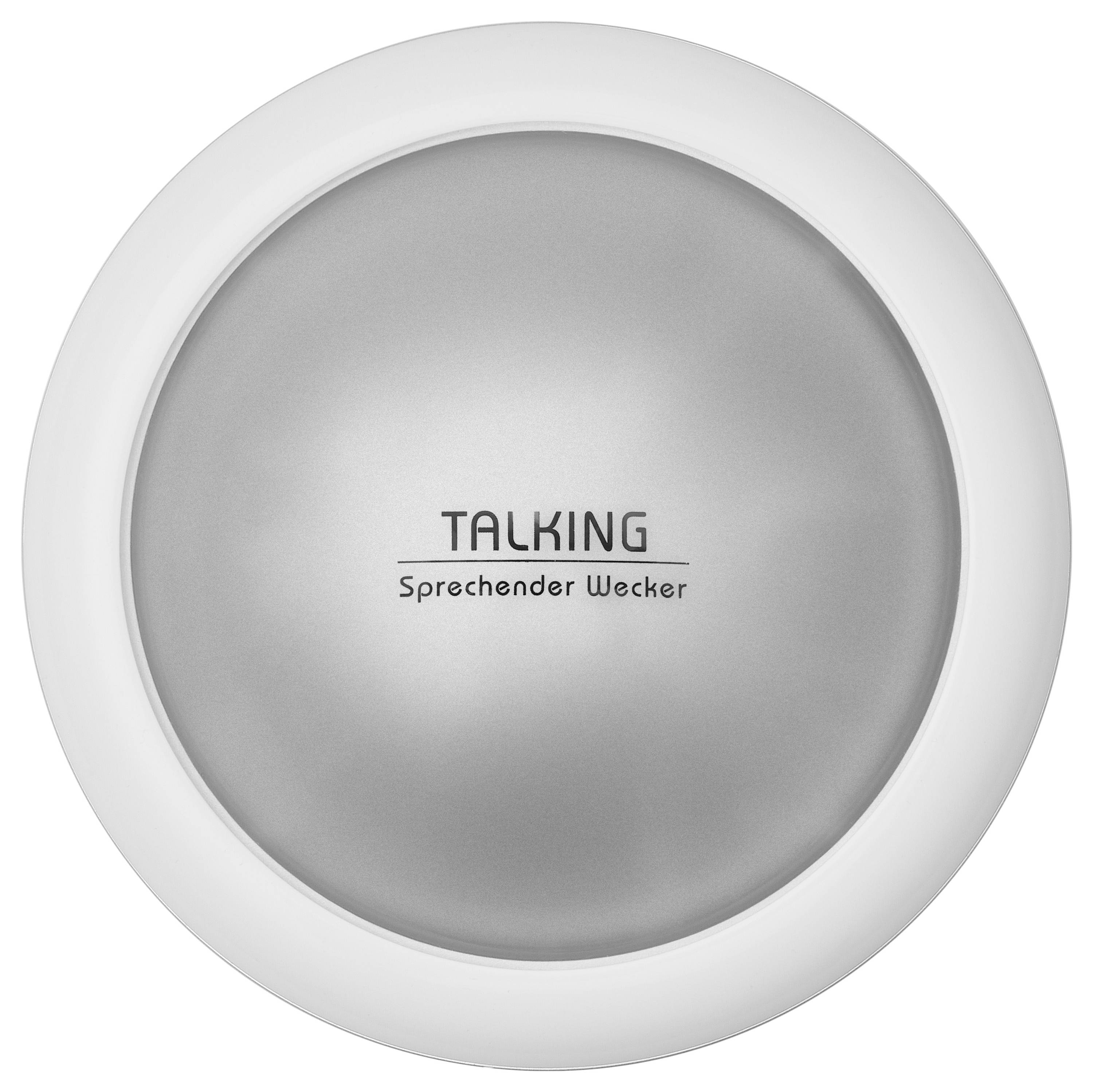 Ein kreisförmiges Gerät mit der Beschriftung ‚TALKING Sprechender Wecker' in der Mitte, höchstwahrscheinlich eine sprechende Uhr, mit einem einfachen runden Design.
