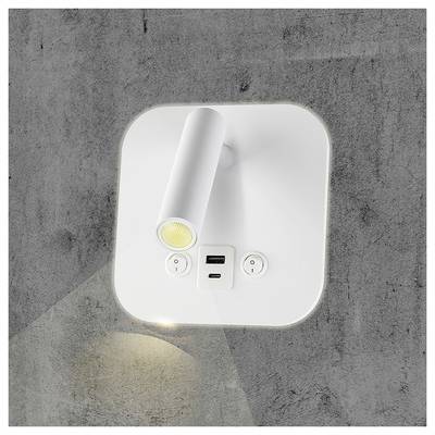 Eine weiße, wandmontierte LED-Leselampe mit einem verstellbaren zylindrischen Kopf, die das Licht nach unten projiziert und unter der Lampe USB-Anschlüsse aufweist.