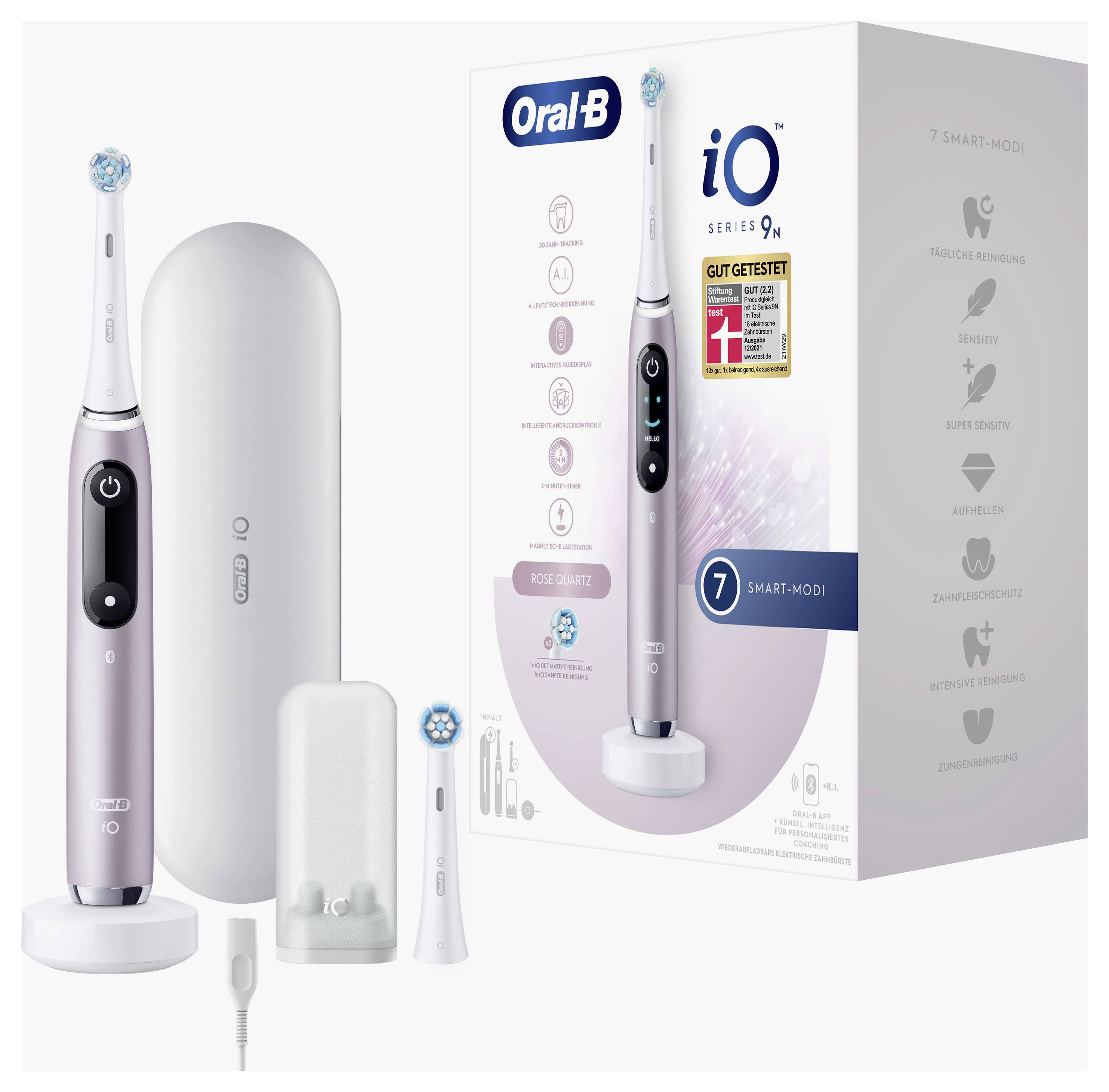 Elektrische Zahnbürste 'Oral-B iO Series 9n' mit Ladebasis, Reiseetui, zusätzlichem Bürstenkopf und Verpackung mit Produktabbildung und Merkmalen.