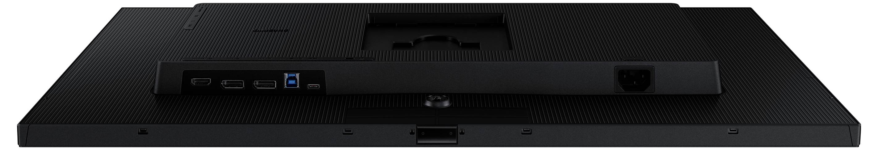 Das Bild zeigt die Rückansicht eines Flachbildschirms mit freigelegten Anschlüssen, darunter zwei USB-Ports und ein Stromanschluss.