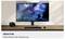 Ein Computermonitor zeigt ein Fantasy-Videospiel mit einem Drachen und einem Krieger. Text liest sich: "Hochglanzdisplay" und "OLED Glare Free".
