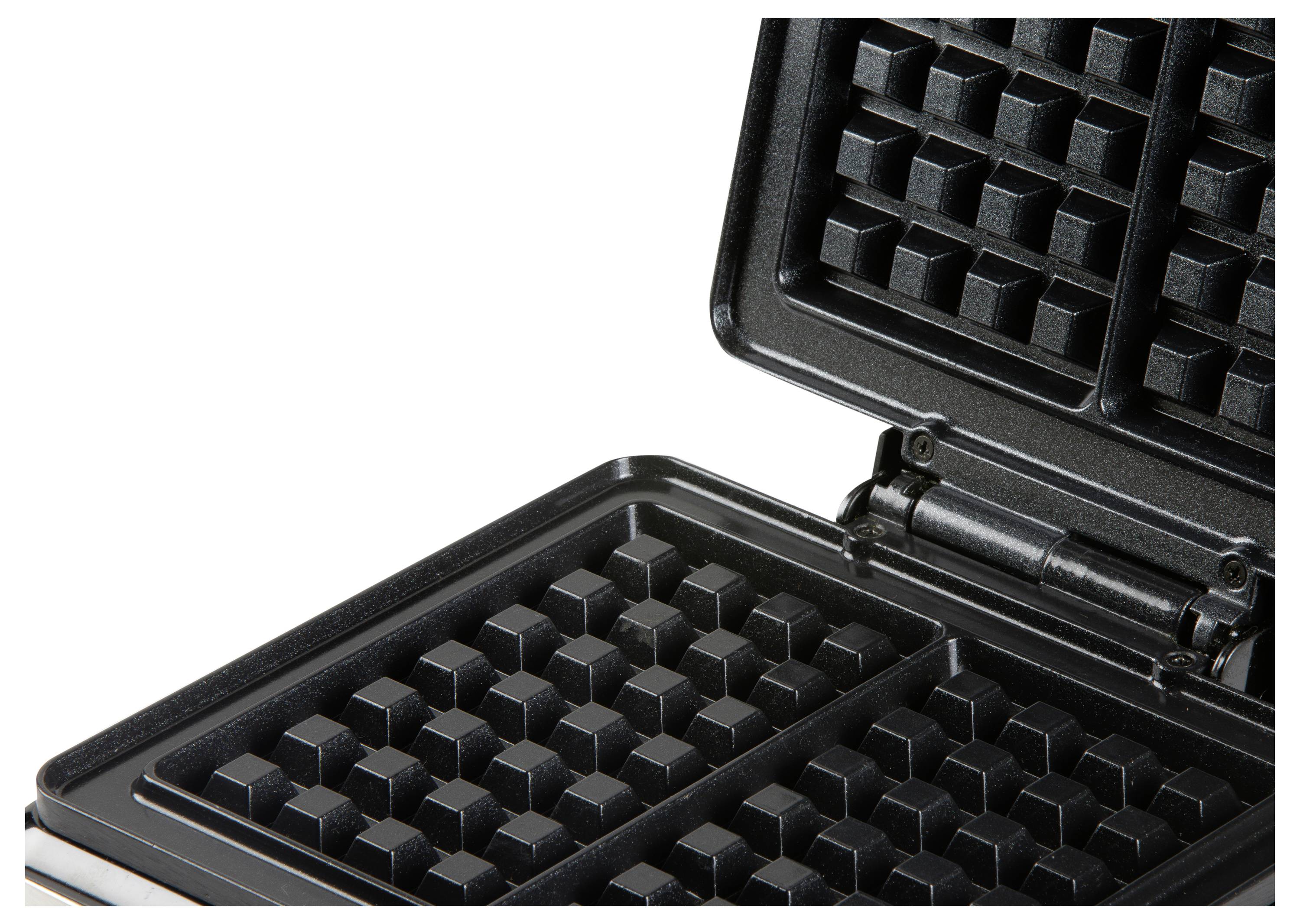 Geöffneter Waffeleisen mit antihaftbeschichteten, gitterförmigen Platten, die zur Verwendung bereit sind.