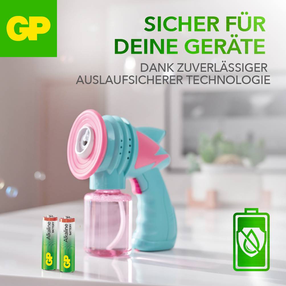 Batteriewerbung mit der Aufschrift 'Sicher für deine Geräte dank zuverlässiger auslaufsicherer Technologie', zeigt zwei AA-Batterien und ein Reinigungsgerät.