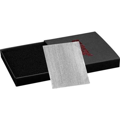 Ein silberfarbener Wärmeleitpad, der auf einem schwarzen Schaumstoffkissen in einer offenen schwarzen Box liegt, auf deren Deckel teilweise das Wort "thermal" zu sehen ist.