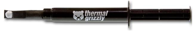 Eine Spritze von Thermal Grizzly Wärmeleitpaste, die zur Verbesserung der Wärmeleitung zwischen Computerkomponenten verwendet wird, mit sichtbarem Logo und Auftragsspitze.