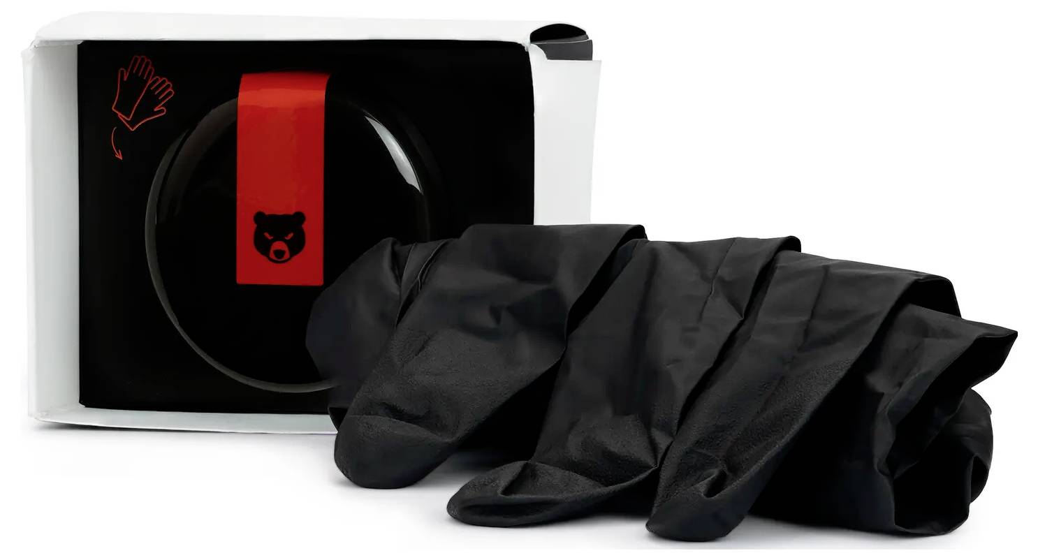 Satz schwarzer Handschuhe in Verpackung mit Bären-Logo und Handschuh-Symbol auf der Schachtel.