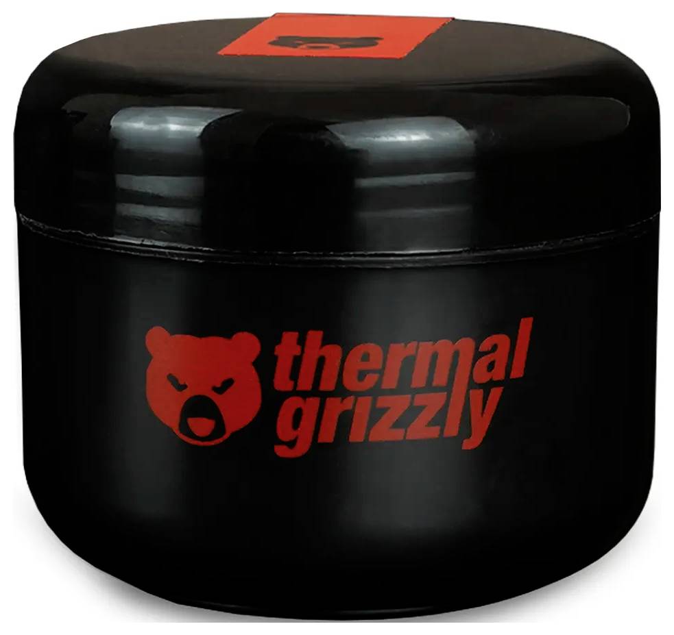 Schwarzer zylindrischer Behälter mit 'Thermal Grizzly' Logo in Rot. Scheint eine Verpackung für Wärmeleitpaste zu sein, die zur Kühlung von Computern verwendet wird.