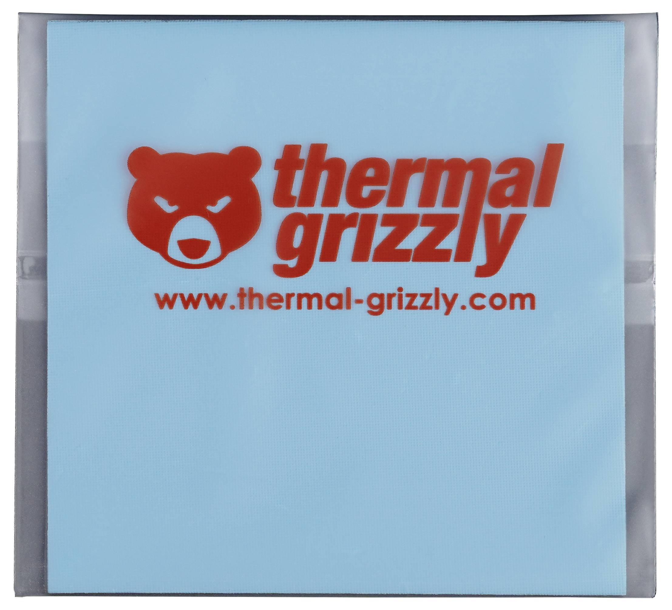 Blaue Verpackung mit einem roten Bärenlogo und dem Text 'thermal grizzly' über einer Website-URL 'www.thermal-grizzly.com'.