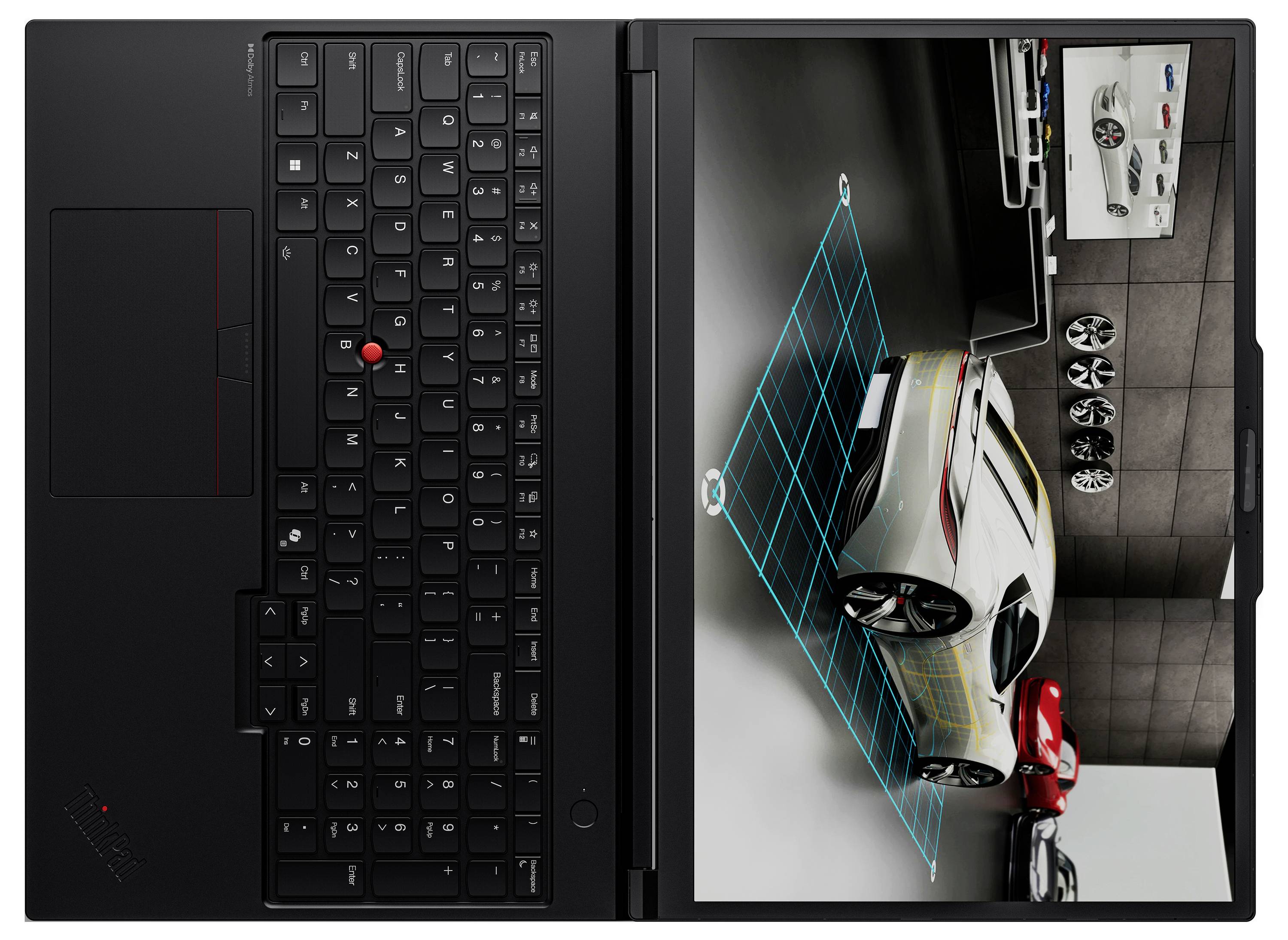 Geöffneter schwarzer Laptop mit einer Autodesign-Software auf dem Bildschirm, auf dem ein 3D-Automodell zu sehen ist, mit Felgen an der Wand. Tastatur und Touchpad sind sichtbar.