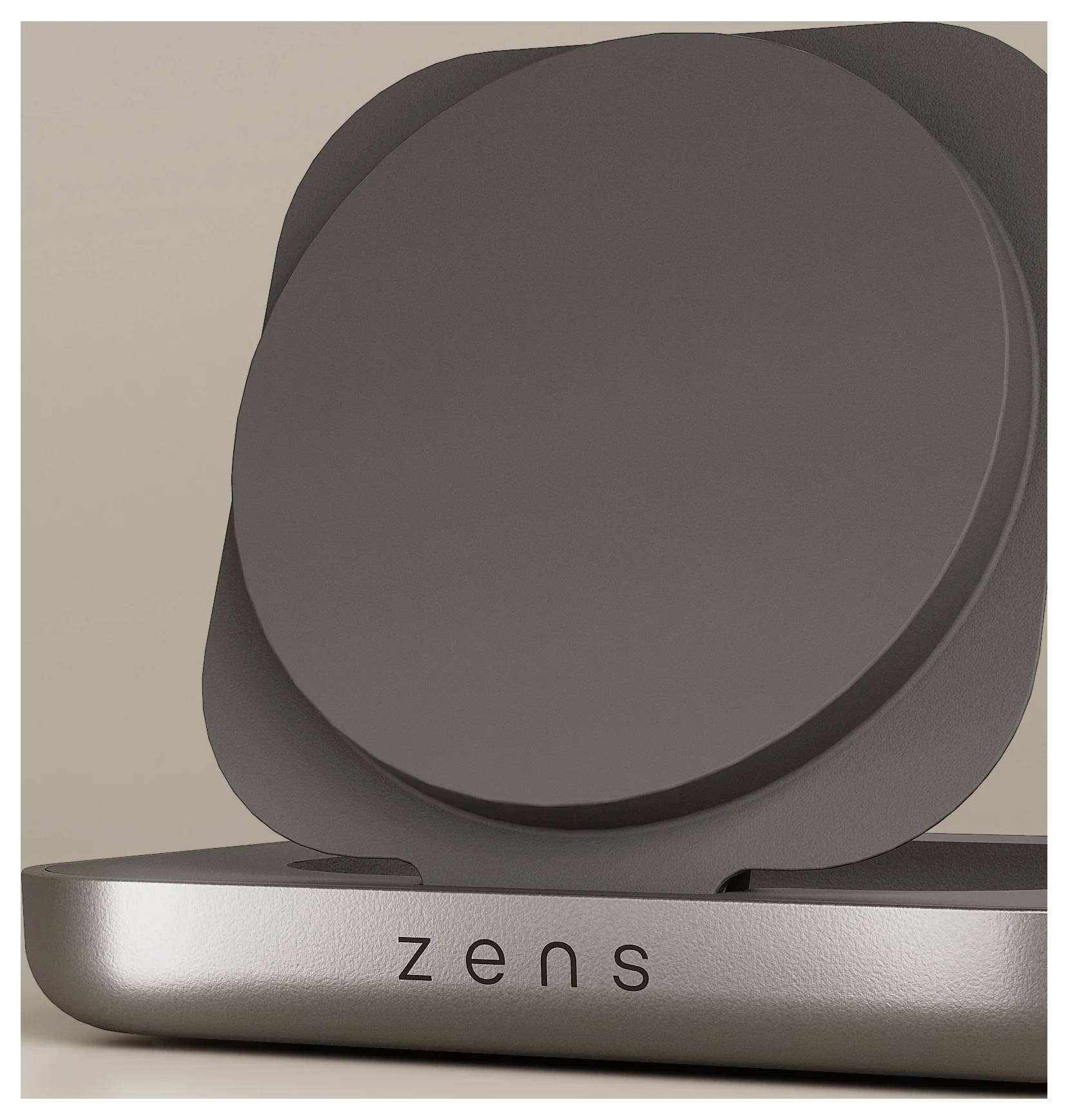 Ein schlanker, moderner drahtloser Ladeständer mit dem Markennamen 'zens', der auf einem neutralen Hintergrund platziert ist.
