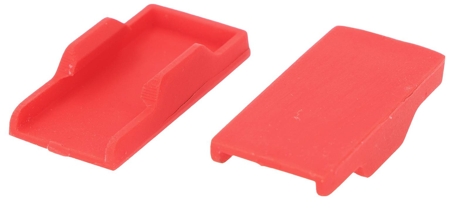 Zwei rote Plastikabdeckungen, eine mit der Vorderseite nach oben und eine mit der Vorderseite nach unten, die ihre rechteckige Form und flache Oberfläche zeigen.