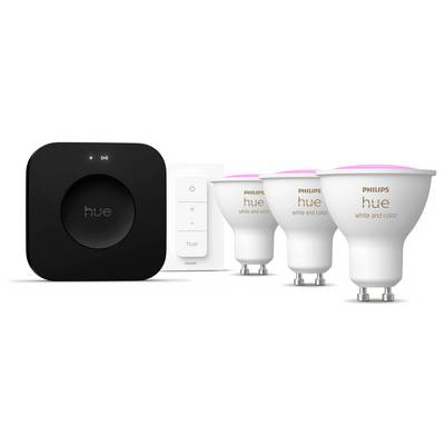 Philips Hue Smart-Beleuchtungsset umfasst drei farbwechselnde Glühbirnen, einen schwarzen Bridge-Hub und einen weißen Wandschalter für die Smart-Home-Integration.