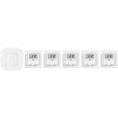 Intelligente Smart-Home-Thermostat-Anzeige, die 21,0 Grad Celsius auf mehreren digitalen Displays zeigt.