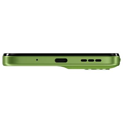 Eine Nahaufnahme aus Seitenperspektive eines grünen Smartphones mit einem zentralen Ladeanschluss, einem kleinen Mikrofonloch links und drei Lautsprecheröffnungen rechts.