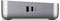 Ein schlankes, kompaktes, metallisches Gerät mit zwei vorderen Anschlüssen, entwickelt für Konnektivität, auf einer ebenen Oberfläche ruhend.
