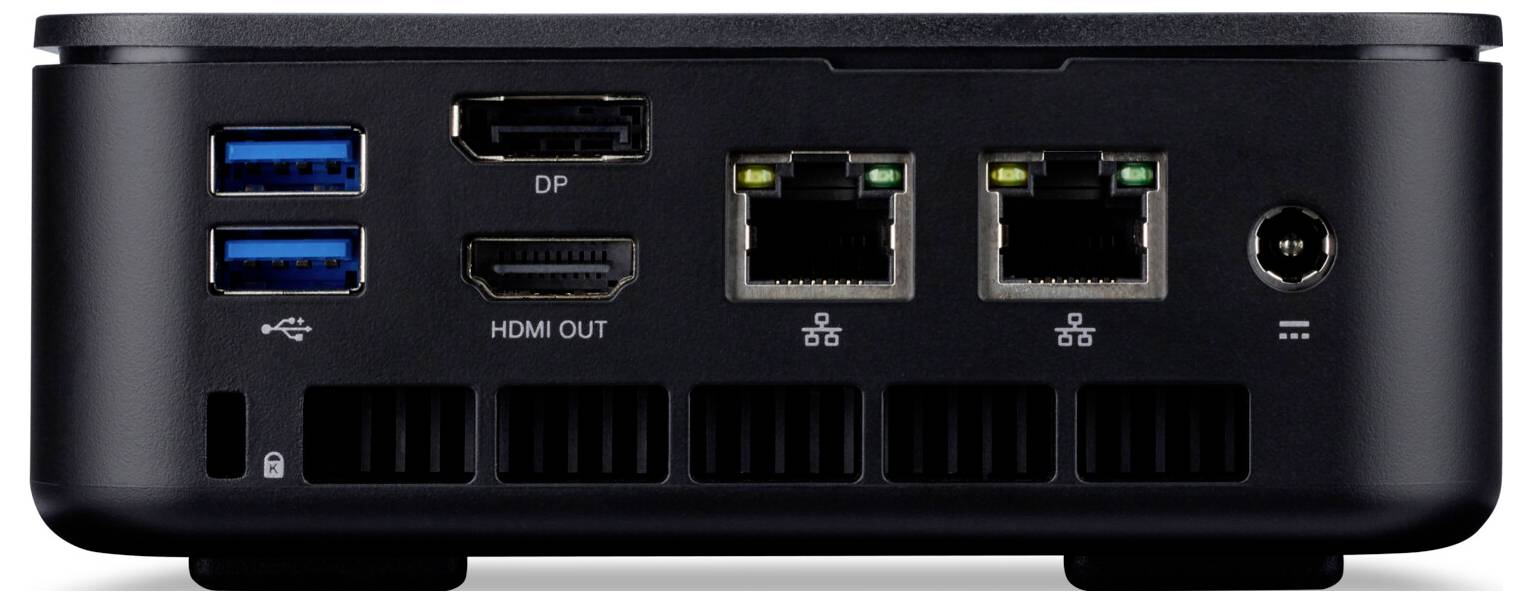 Ein schwarzer Computer Mini-PC mit sichtbaren Anschlüssen, einschließlich USB, DisplayPort, HDMI, Ethernet und Stromanschluss.