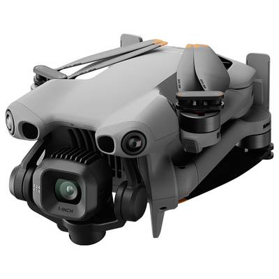 Eine kompakte, graue Quadcopter-Drohne mit einer an der Front montierten Kamera, deren Arme und Propeller zusammengeklappt sind und die transportbereit ist.