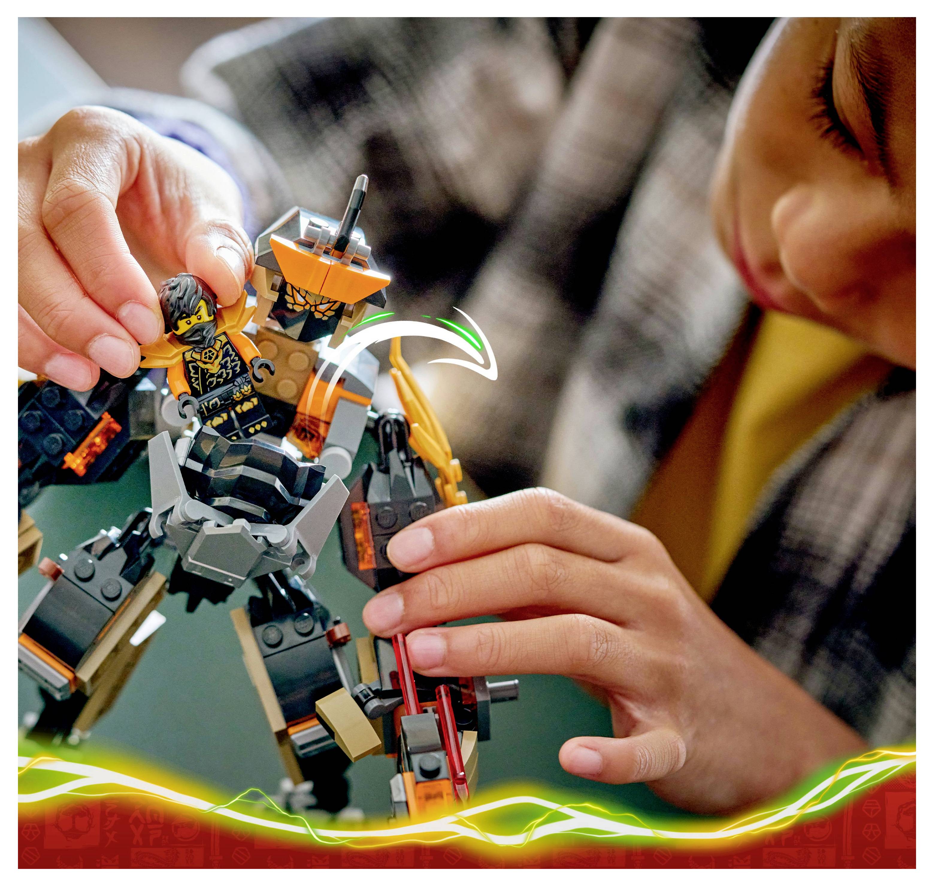 Ein Kind, das ein großes, buntes Roboterspielzeugmodell aufmerksam zusammenbaut und sich konzentriert darauf konzentriert, die Teile richtig zu positionieren.