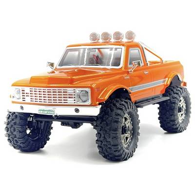 Ein heller orangefarbener Spielzeug-Monstertruck mit großen, robusten Reifen und detaillierter Außenansicht, der eine kleine Beschriftung "CRISP.EV6" auf der Front trägt.