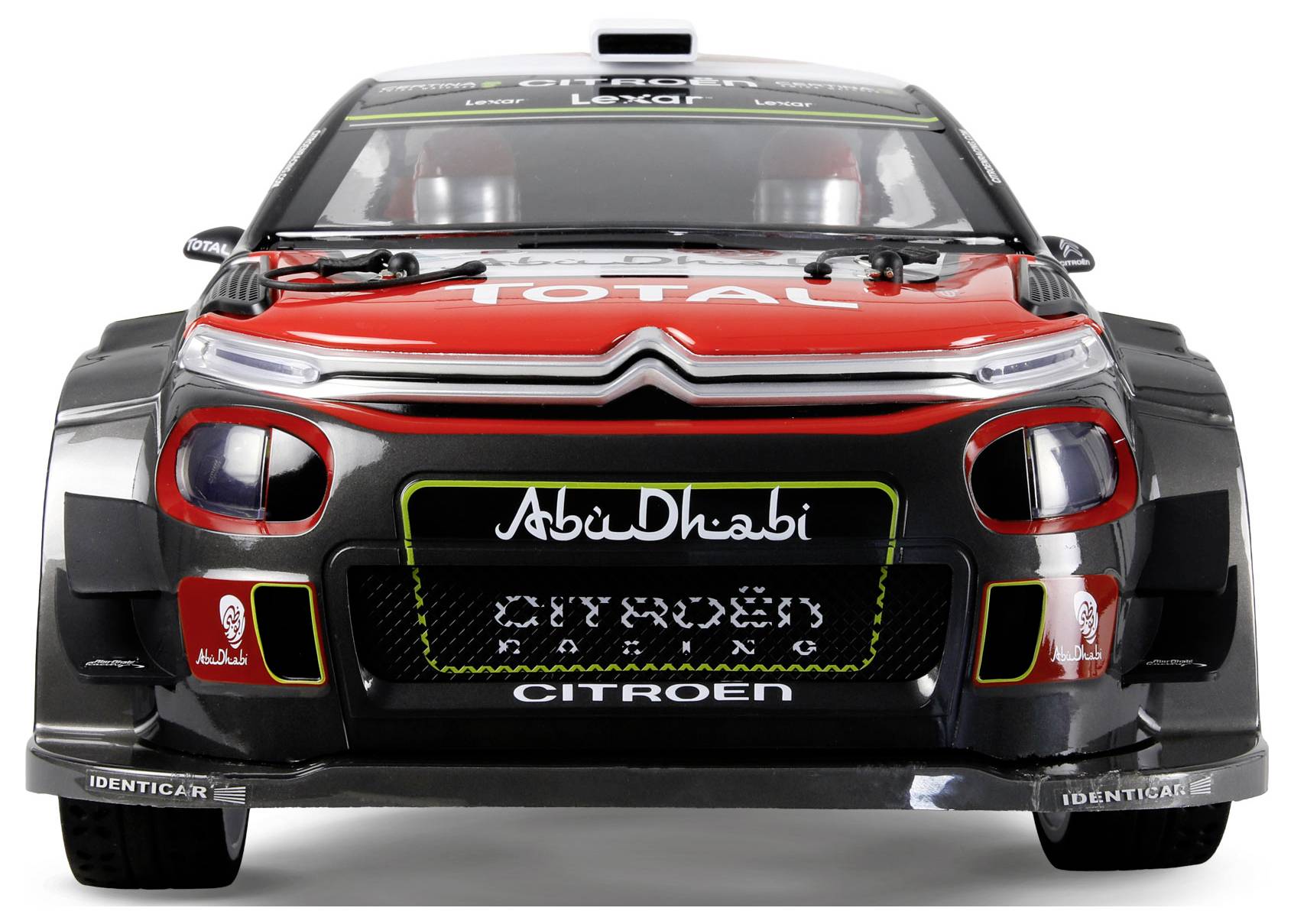 Ein rot-schwarzer Citroën-Rallyewagen mit 'Abu Dhabi' und 'Total' Logos auf der Motorhaube, versehen mit Renndekors und Sponsorenaufklebern.