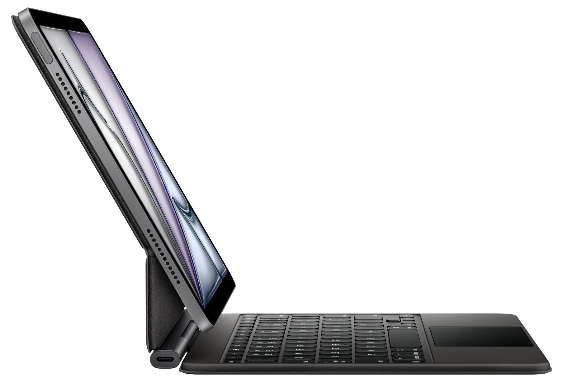 Seitenansicht eines Tablets auf einem Tastaturständer. Das Display zeigt eine abstrakte Grafik. Verwendet als Laptop-Ersatz.