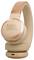 Beige kabellose Over-Ear-Kopfhörer mit dem Markenfirmenlogo, ausgestattet mit gepolsterten Ohrmuscheln und einem verstellbaren Kopfbügel.