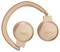 Ein Paar Over-Ear-Kopfhörer von JBL in Roségold mit einem mit Stoff überzogenen Kopfbügel, die vor einem weißen Hintergrund präsentiert werden.