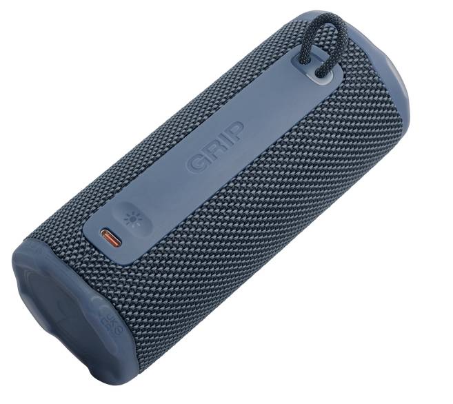 Ein blauer tragbarer Bluetooth-Lautsprecher mit einer zylindrischen Form, strukturierter Griffoberfläche und Bedienungstasten auf der Oberseite.