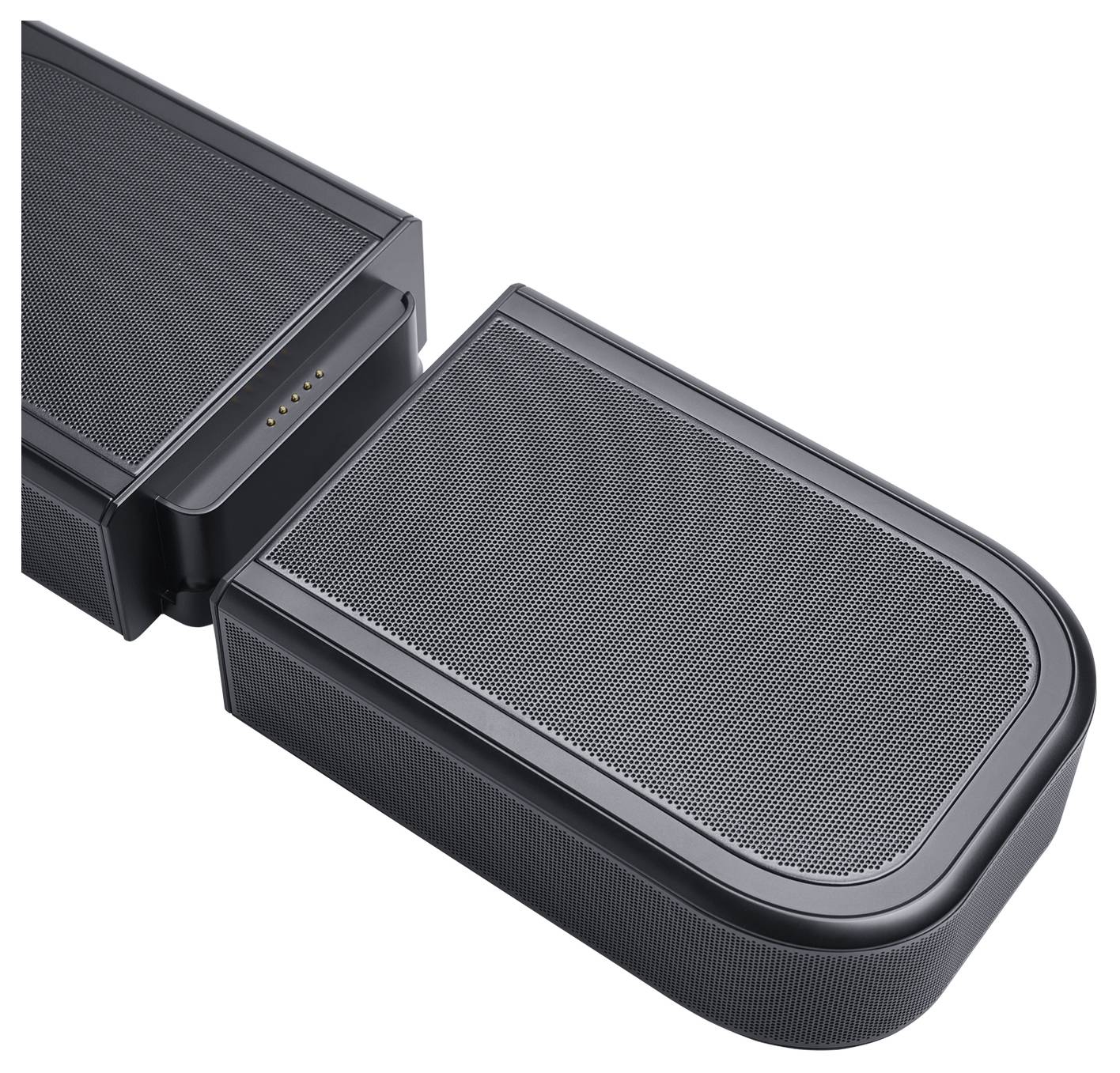Nahaufnahme einer schwarzen Soundbar mit einem abnehmbaren Lautsprecher, der die Meshfront des Lautsprechers und die elektronischen Anschlüsse zeigt.