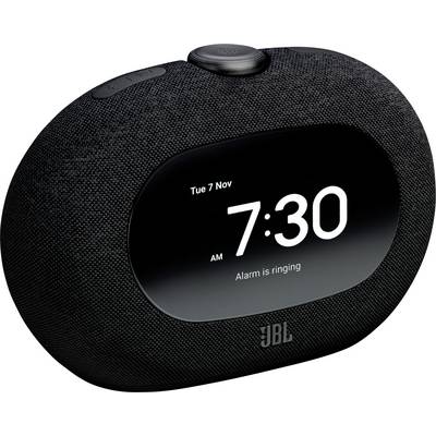Eine schwarze digitale Alarmklingel mit Stoffbezug zeigt '7:30 Uhr' und 'Alarm klingelt' am Dienstag, den 7. November.