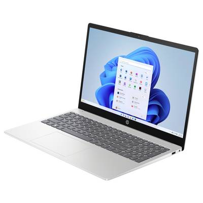 Ein silberner Laptop, der den Windows 11 Startbildschirm mit verschiedenen Anwendungssymbolen zeigt.