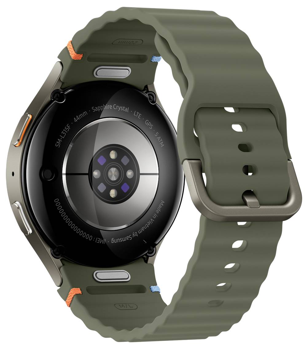 Eine Smartwatch mit rundem, dunklem Display und mehreren Sensoren auf der Rückseite, ausgestattet mit einem olivgrünen Gummiarmband und einer Metallschnalle.