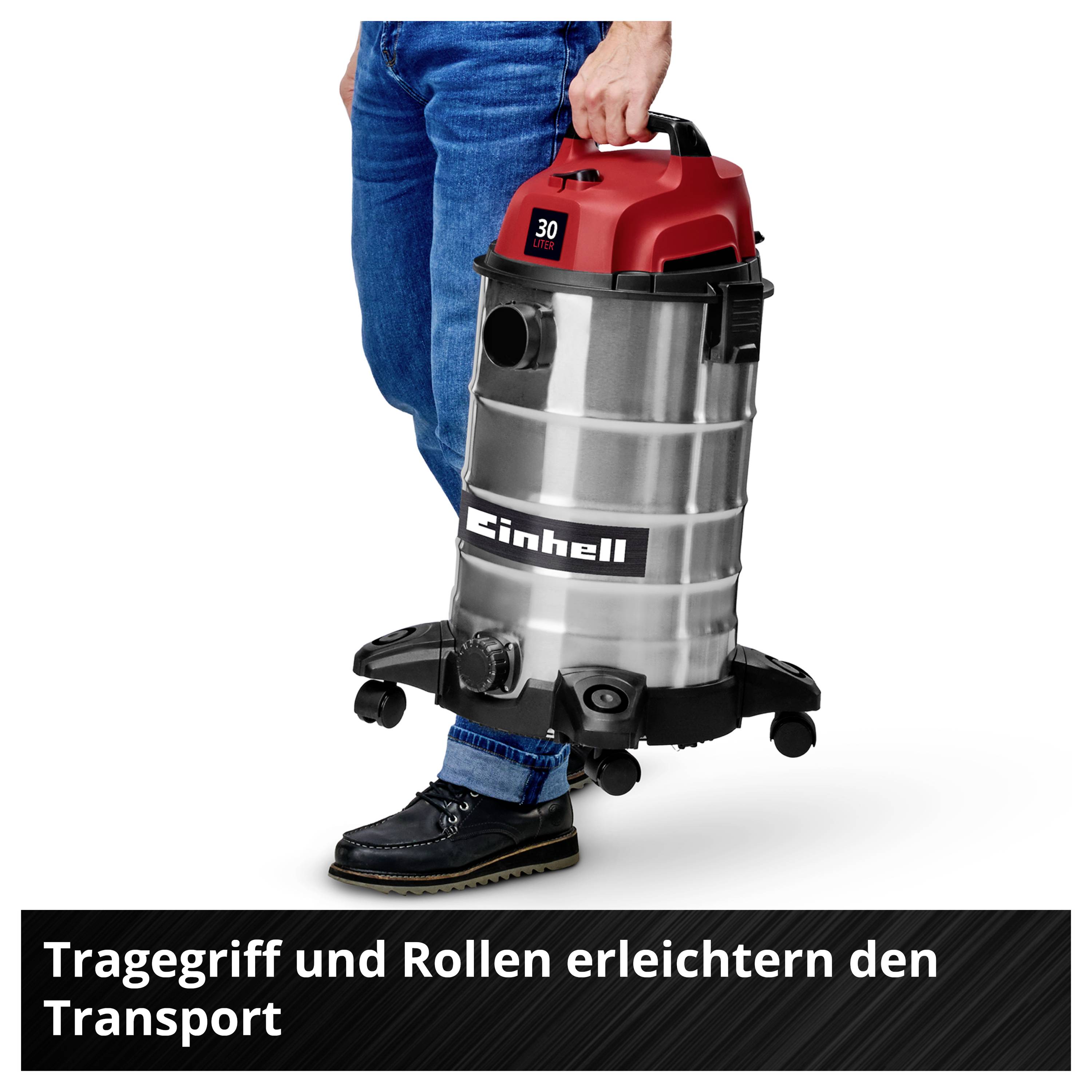 'Mann hält Industriestaubsauger mit Tragegriff und Rollen. Textkasten unten: Tragegriff und Rollen erleichtern den Transport.'