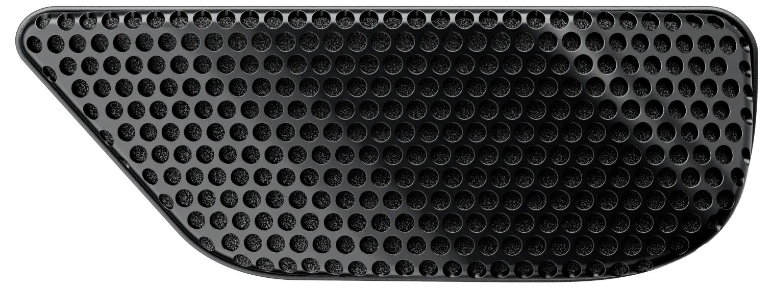 Eine Nahaufnahme eines schwarzen, ovalen Lüftungsgitters mit einem Raster aus kreisförmigen Öffnungen, das zur Belüftung oder aus ästhetischen Gründen verwendet wird.