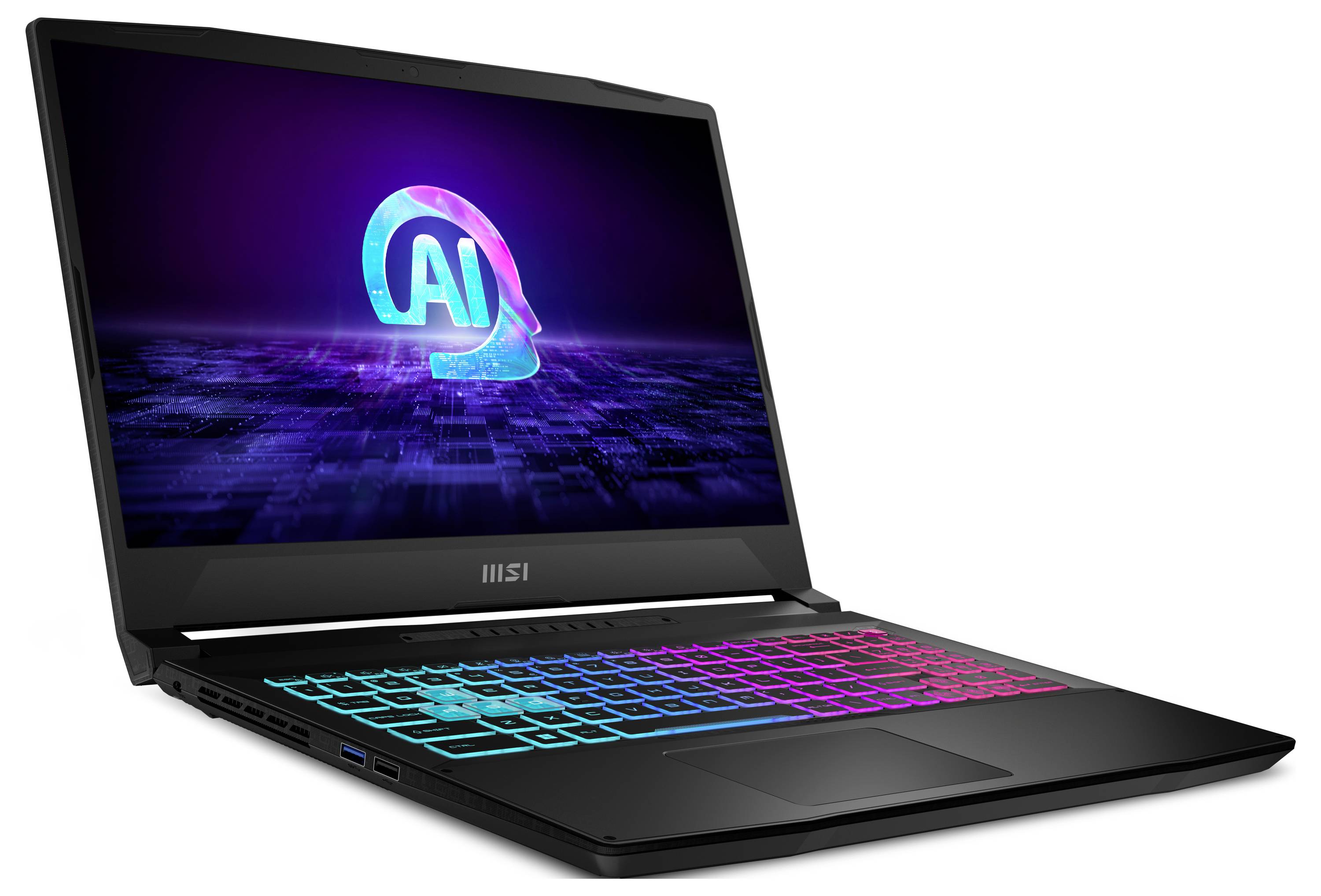 Ein schwarzer Laptop mit Regenbogen-Hintergrundbeleuchtung der Tastatur zeigt einen Bildschirm mit einem blauen 'KI'-Logo auf einem technisch geprägten Hintergrund.