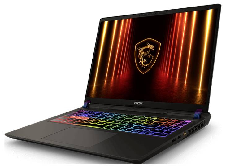 Ein Gaming-Laptop mit einer farbenfrohen beleuchteten Tastatur, auf dem Display ein Drachenemblem, vor einem beleuchteten, orangefarbenen Hintergrund.
