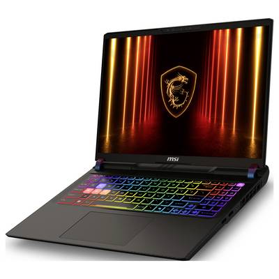 Ein Gaming-Laptop mit einer bunten RGB-Tastatur und einem beleuchteten Drachenlogo auf dem Bildschirm, vor einem dunklen Hintergrund mit orangefarbenen Lichtern.