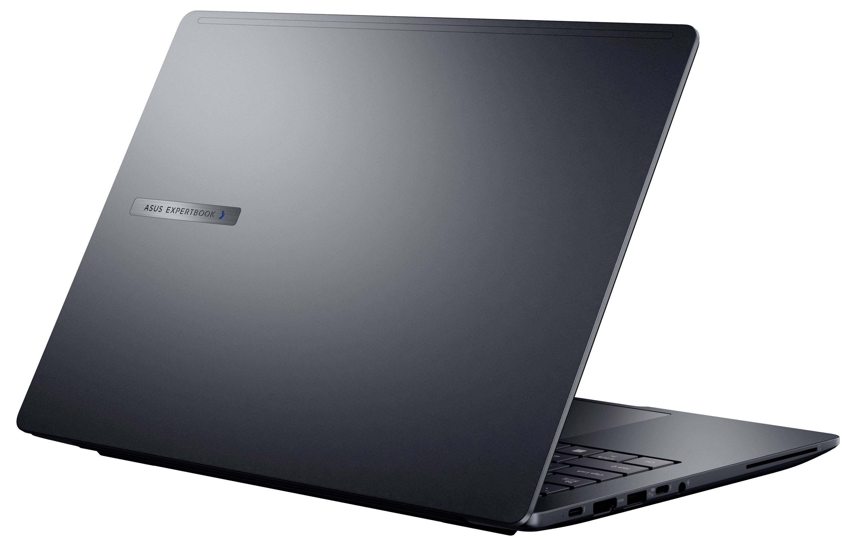 Ein schlankes, geschlossenes Laptop, aus der Rückansicht von links, mit matter, dunkler Oberfläche und einem 'Asus' Logo auf dem Deckel.