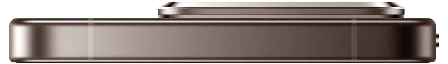 Rechteckiges, metallisches Objekt, von der Seite betrachtet, mit hervorstehendem oberen Rand, wahrscheinlich ein Stück elektronischer Ausrüstung.