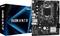 ASRock H410M-H/M.2 SE Mainboard neben seiner Verpackungsschachtel, mit mehreren Anschlüssen und Steckplätzen für einen Computeraufbau.