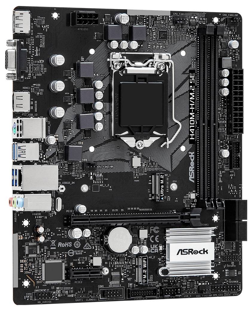 „Eine schwarze ASRock H410M-HVS R2.0 Mainboard mit beschrifteten Abschnitten für CPU, RAM-Steckplätze und verschiedenen Anschlussports, auf weißem Hintergrund platziert."