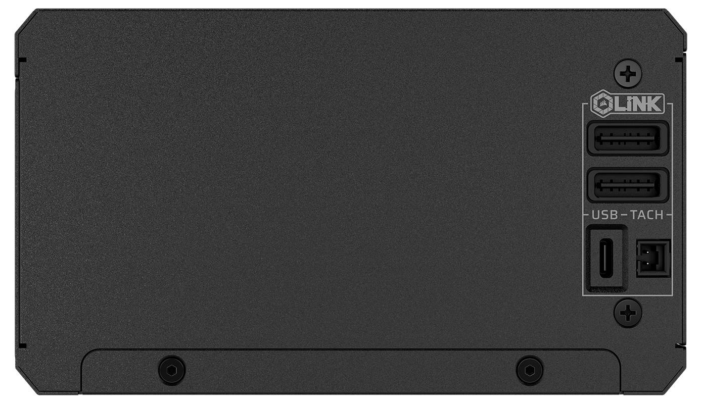 Ein schwarzes elektronisches Gerätepanel mit zwei USB-Anschlüssen, einem USB-TACH-Port und einem kleinen beschrifteten Abschnitt mit dem Text "Link" in der oberen rechten Ecke.