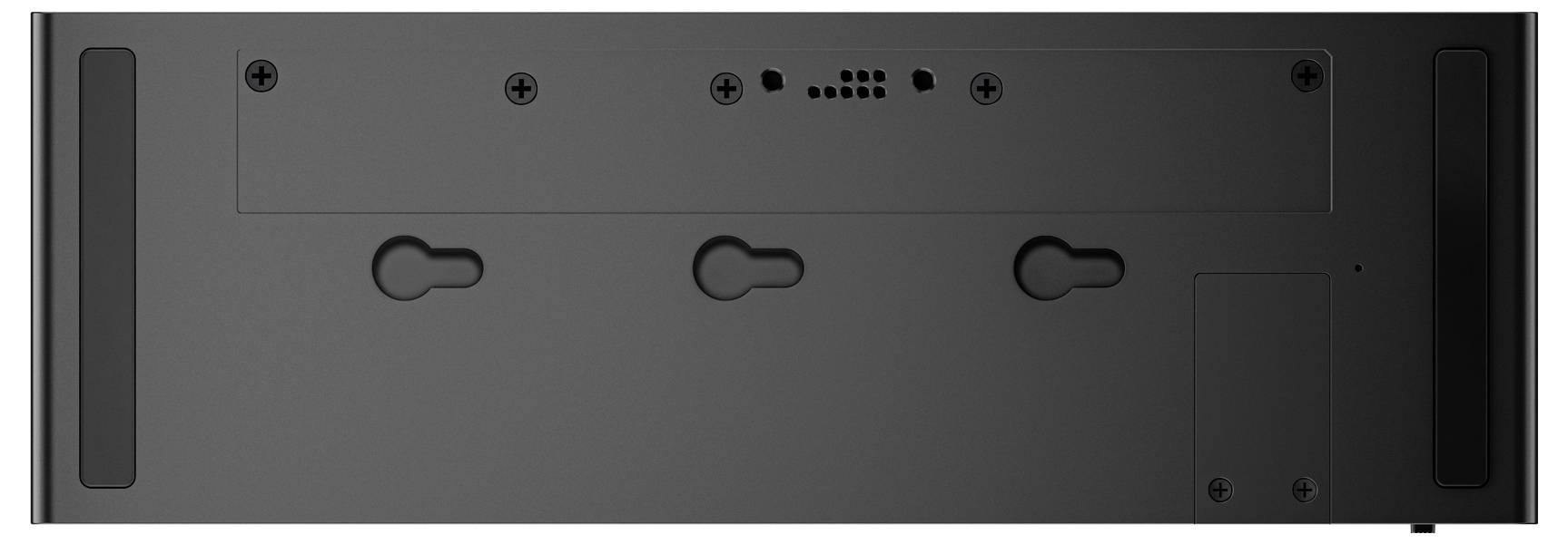 Ein schwarzes elektronisches Gerät mit Schraublöchern und Lüftungsschlitzen am Boden, offensichtlich für die Wandmontage oder eine ähnliche Installation vorgesehen.