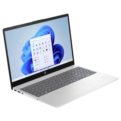 Ein silberner Laptop, der einen Startbildschirm mit Symbolen und Windows-Benutzeroberfläche zeigt, vor einem hellen Hintergrund.