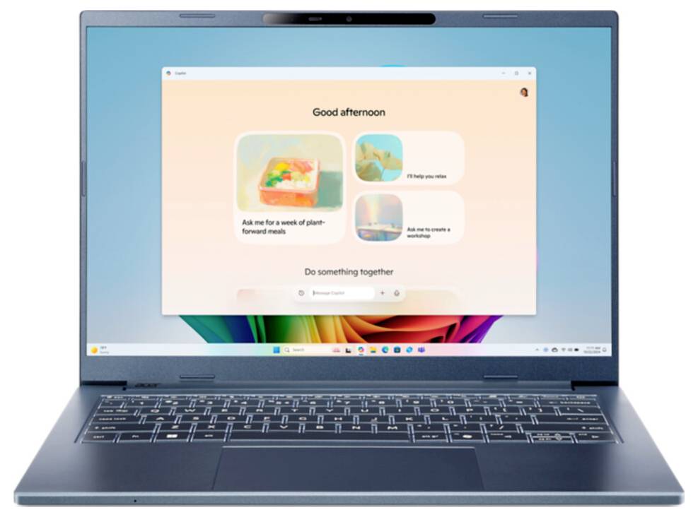 Ein Laptop, der einen Bildschirm mit einer freundlichen Benutzeroberfläche zeigt. Der Text liest sich "Guten Tag" und schlägt Aktivitäten wie gemeinsames Kochen vor.