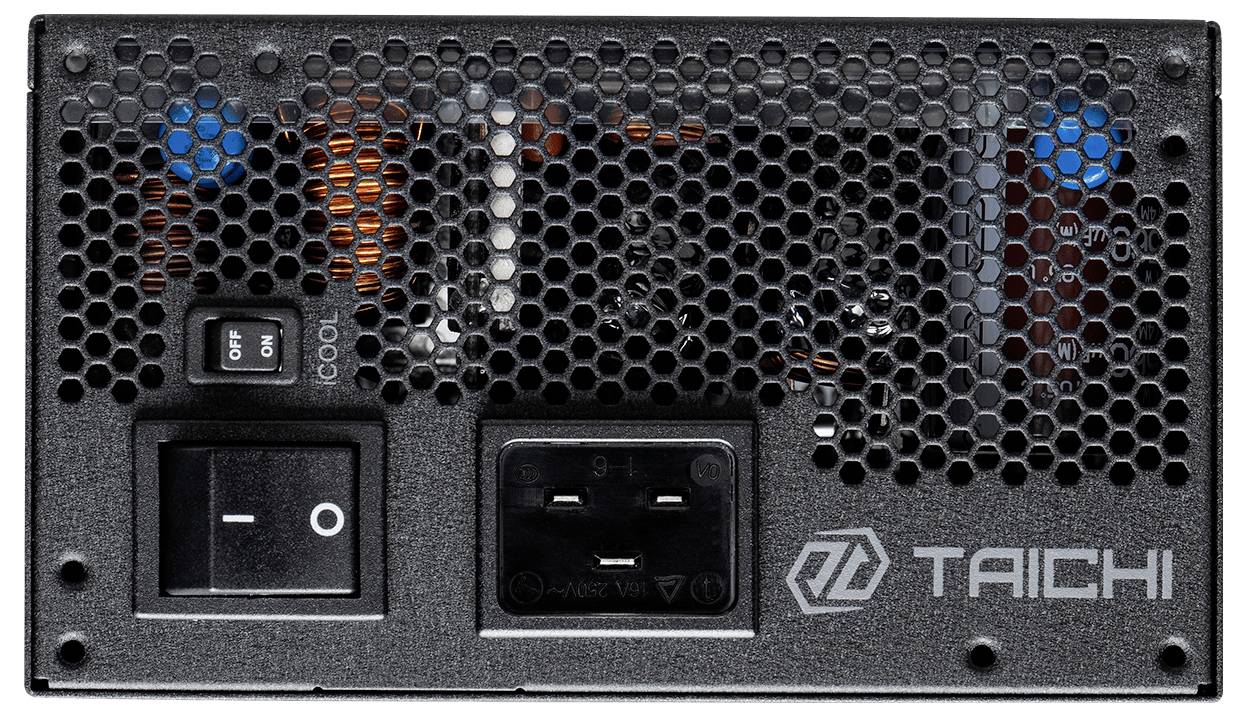 Netzteil der Marke 'TAICHI' mit Kühlventilator, Ein-/Aus-Kippschalter und sichtbarem Hauptstromanschluss. Das Design verfügt über eine Maschengitterabdeckung.