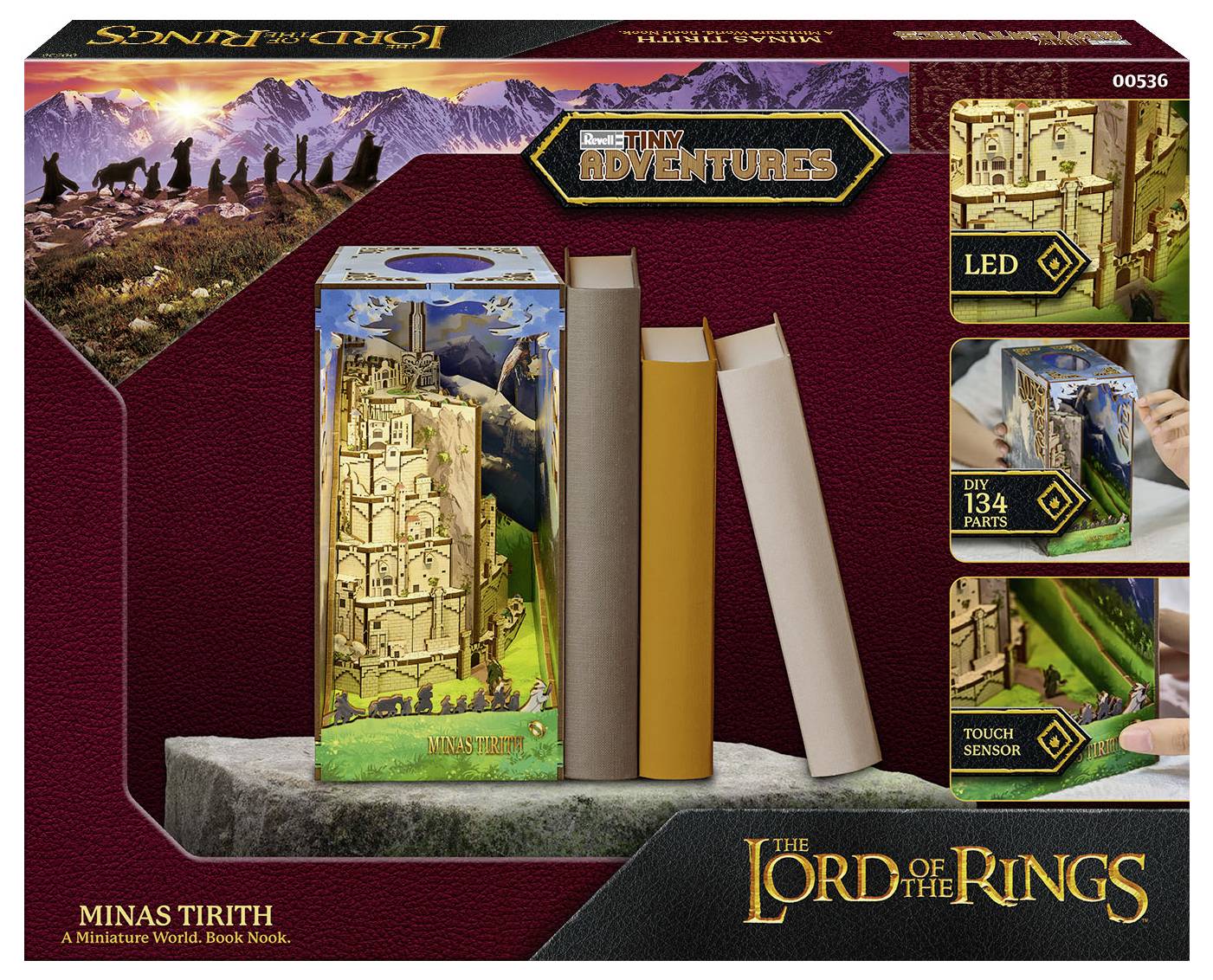 Das Bild zeigt einen 'Minas Tirith' Miniatur-Bucheinsatz aus der 'Der Herr der Ringe' Reihe, mit detaillierten Burgstrukturen, LED-Beleuchtung und 134 Einzelteilen.